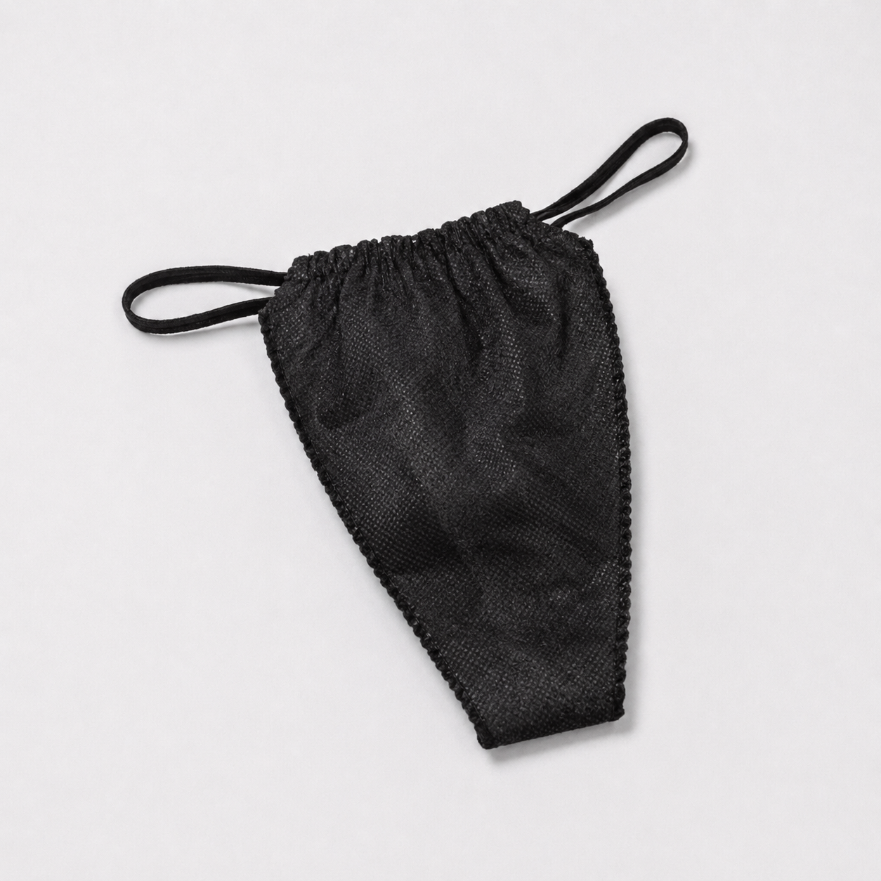 PW Nonwoven - Culotte bikini universelle pour femmes, noire, 1 pièce.